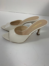 Mules in pelle color burro