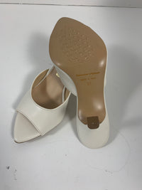 Mules in pelle color burro