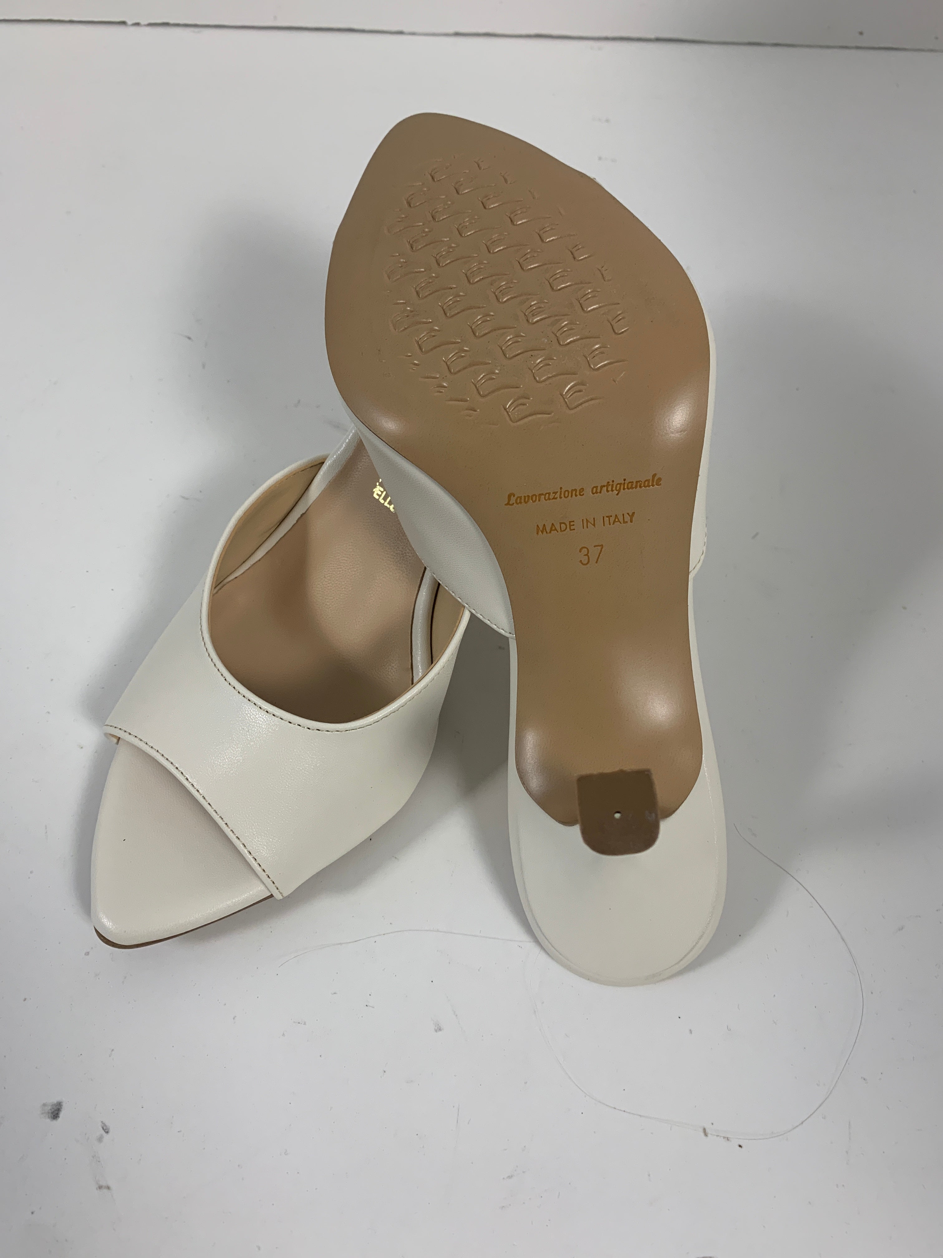 Mules in pelle color burro
