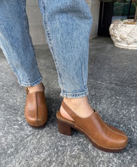 Cinzia Soft cognac leather heeled clogs with adjustable strap